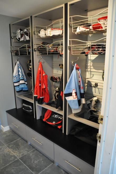 Nice large drawers. After: Makeshift Mudroom Mudroom Hockey Storage, Hockey Gear Storage, Hockey Equipment Storage, Mudroom Garage, Sports Equipment Storage, Hockey Bedroom, Sports Locker, Gear Room, Love It Or List It