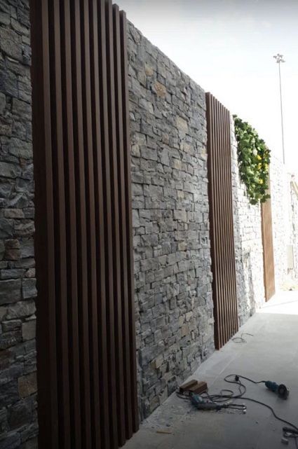 20 Modern Compound Wall Elevation Designs In 2023 Modern Compound Wall, Wall Elevation, Fence Wall Design, Compound Wall Design, Garden Wall Designs, Front Wall Design, Exterior Wall Cladding, House Fence Design, Stone Wall Design