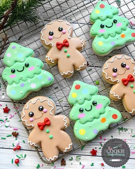 Smiling Christmas Trees and Gingerbread Man Cookies Gingerbread Cookies Ideas Decoration, Gingerbreadman Decorations, Christmas Cookies Decorated Icing, Gingerbread Cookie Ideas, Christmas Royal Icing Cookies Ideas, Christmas Cookies Decorated Ideas, Christmas Cookie Decorations, Cookie Decorating Christmas, Christmas Cookies Royal Icing