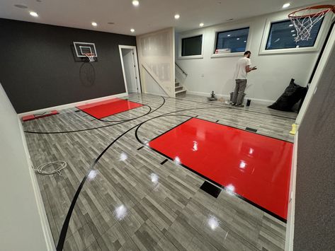 Check Out this amazing indoor mini basketball court in Chicago!  This court features our Maple Select surface, two mini hoops, and wall carpeting. From slam dunks to epic three-pointers, this compact court packs a punch of fun for the whole family. Who says you need a full-size court to shoot hoops like a pro? Get your game on with a custom court from Sport Court Midwest! Contact us at 630-350-8652 for a free estimate.  #Basketball #SportCourt #SportCourtMidwest 🏠🔥🏀 Small Indoor Basketball Court, Mini Basketball Court, Home Basketball Court, Indoor Basketball Court, Indoor Basketball, Mini Basketball, Mini Basketballs, Sport Court, Design Your Dream House