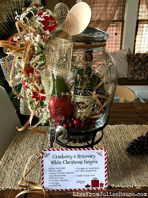 I once owned a gift basket business, so I’m no stranger to “collected” gifts.  In the 10 years I had the store I made coffee baskets, tea baskets, pasta dinner baskets, chocoholic baskets – you name it, I probably made hundreds if not thousands of … Sangria Gift Basket Ideas, Winter Sangria, Christmas Sangria, For Boyfriend, Auction Baskets, Raffle Baskets, Red Sangria, Themed Gift Baskets, Diy Gift Baskets