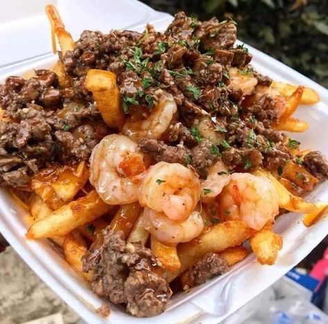 Steak and shrimp loaded freestyle fries on a plate Fries Recipe Loaded, Loaded Fries Recipe, Seafood Lasagna Recipes, Seafood Gumbo Recipe, Steak Shrimp, Paella Recipe Seafood, Sea Food Salad Recipes, Crispy Fries, Steak And Shrimp