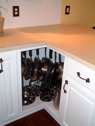 Hooks inside cabinets to hang pans, why didn't I think of THAT??? I think I will remove a shelf this weekend to make this happen! Kitchen Cabinets Upgrade, Pantry Organization Ideas, Kitchen Ikea, Hanging Pans, Pan Organization, Organized Kitchen, Inside Cabinets, Dollar Store Organizing, Diy Kitchen Cabinets