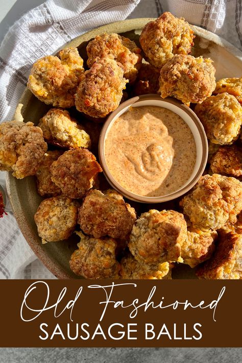 A serving dish filled with Old Fashioned Sausage Balls and a ramekin of Cajun Dipping Sauce Cajun Sausage Balls, Sausage Ball Dip, Sausage Balls Dipping Sauce, Southern Sausage Balls, Sausage Ball Dipping Sauce, Sauce For Sausage Balls, Dipping Sauce For Sausage Balls, Dipping Sauce For Sausage, Dip For Sausage Balls