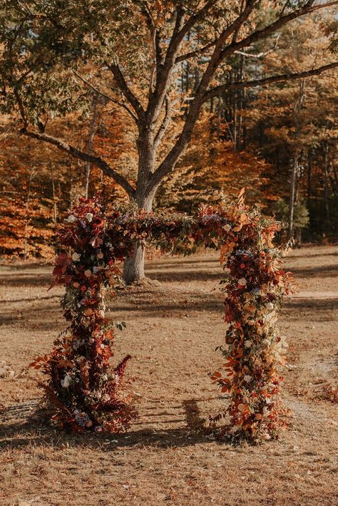 How stunning is this colorful floral arch for a fall elopement? We love the unique tones for the wooded Maine wedding venue. Check out more details from this day on the blog. Fall Wedding Arch, Rustic Elopement, Fall Leaf Wedding, Fall Wedding Arches, Fall Elopement, Floral Arch Wedding, Outdoor Wedding Photography, Outdoor Wedding Inspiration, Ceremony Design