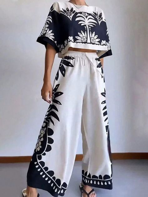 SHEIN Clasi Women's Summer Vacation Flower Printed Round Neck Batwing Sleeve Cropped Top And Wide Leg Pants Casual Two-Piece SetI discovered amazing products on SHEIN.com, come check them out! Top And Wide Leg Pants, Wide Leg Pant Suit, Mode Kimono, Exotic Holiday, Causal Outfits, Two Piece Pants Set, Ethnic Print, Tropical Island, Short Sleeve Cropped Top