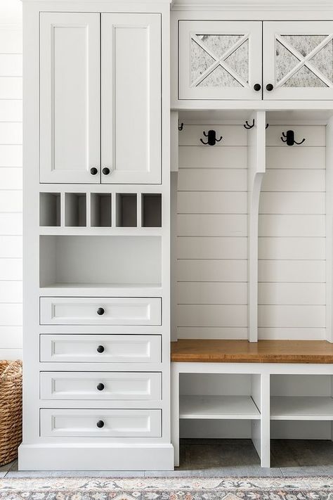 Mudroom Cabinet Dropzone Mudroom Cabinet Dropzone The mudroom upper cabinets are inset with antiqued mirror Mudroom Cabinet Ideas Dropzone Mudroom Cabinet #Dropzone #Mudroom #Cabinet Vstupná Hala, Mudroom Cabinets, Mud Room Entry, Shiplap Backsplash, Mudroom Lockers, Mudroom Entryway, Mudroom Decor, Mudroom Laundry Room, Mud Room Storage