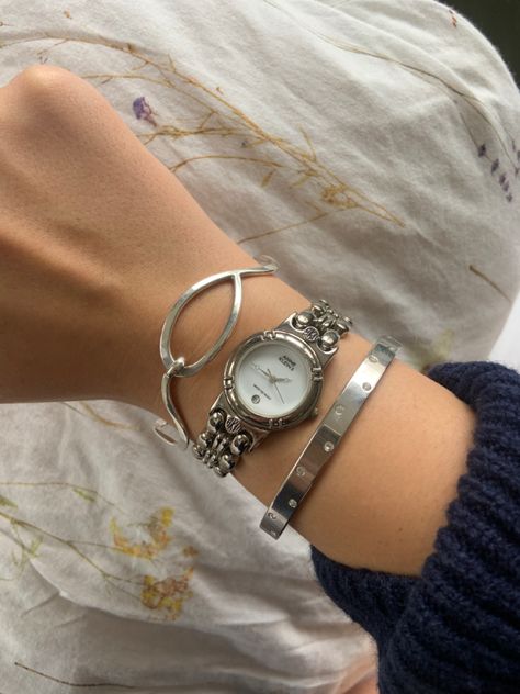 Silver Watch Bracelet Stack, Silver Jewerly Girl Aesthetic, Silver Watch And Bracelet Stack, Silver Jewellery Watch, Silver Bracelet Stack With Watch, Silver Watch Aesthetic Women, Silver Jewellery Stacking, Silver Vintage Watches Women, Silver Jwellary Aesthetic