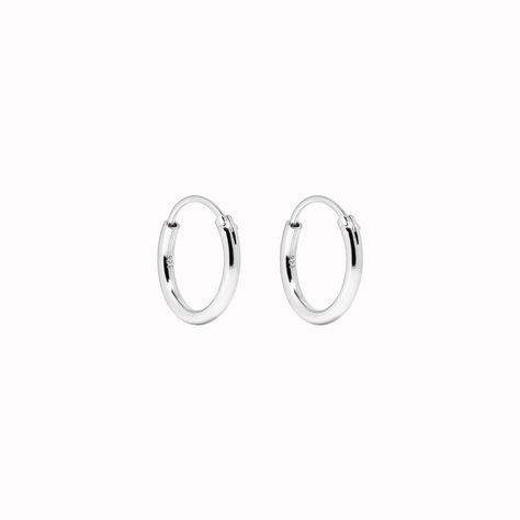 Handcrafted in sterling silver, these classic hoop earrings measure at 12mm Simple Silver Earrings, Small Silver Hoop Earrings, Trendy Rings, Dainty Hoop Earrings, Rings Jewelry Fashion, Sustainable Jewelry, Traditional Jewelry, Sterling Silver Hoops, Recycled Sterling Silver