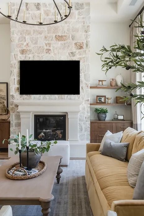 Top 10 Reasons to Renovate Your Fireplace - Nikki's Plate Mantel Over Stone Fireplace, 20ft Fireplace Wall, Neutral Stone Fireplace, European Farmhouse Fireplace, Stone Fireplace With White Mantle, Stone Fireplace With Tv, Bright Airy Kitchen, Fireplace Refacing, Tile Fireplaces