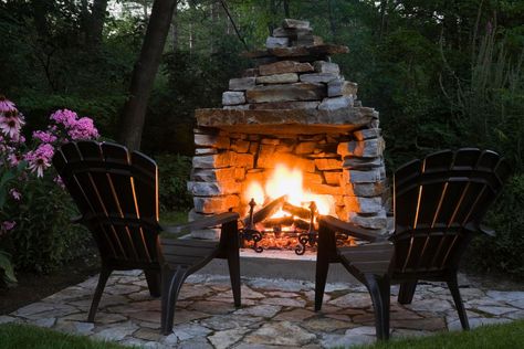 Use one of these outdoor fireplace construction plans to build a new feature for your yard that looks great and will keep you warm. Rustic Outdoor Fireplaces, Diy Fire Pit Ideas, Outdoor Fireplace Plans, Outdoor Stone Fireplaces, Diy Outdoor Fireplace, Rustic Fire Pits, Fireplace Kits, Outdoor Fireplace Designs, Outdoor Gas Fireplace