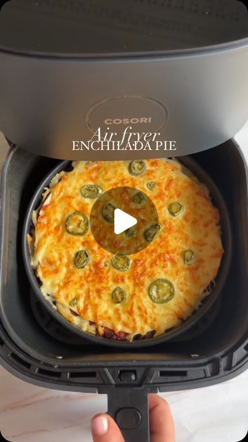 Hayley Dean on Instagram: "Air fryer chilli enchilada pie 🥧 WOW this is amazingggg 😍 so start by spraying oil in a tin, add a tortilla, some warmed up chilli, a sprinkle of cheese, repeat until you’ve used up 4 wraps, last wrap with just cheese and jalapeños on top, air fry on 160 for about 15 minutes or until bubbling and golden, delish with a dollop of sour cream! For loads more air fryer recipes check out my books! Both available on Amazon and the link is in my bio ❤️😍" Air Fryer Tortilla Wraps, Air Fryer Wraps, Enchilada Pie, Fried Jalapenos, Fryer Machine, Tortilla Wraps, Air Fry, My Books, April 13