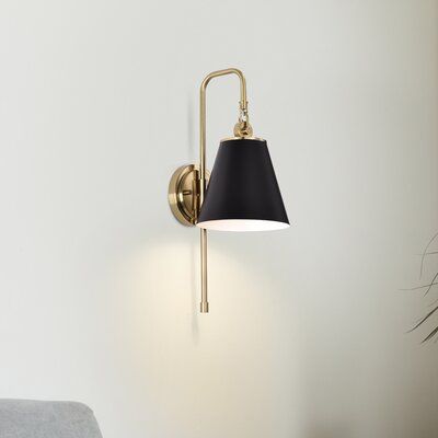 With subtle detailing, the Dover wall sconce is graceful yet unassuming. The simple shade features a trim finish that matches the fixture's body. Place in a dining room for ambiance, or bring added light to a dark hallway or entry. Shade Color: Black/Vintage Brass | Everly Quinn Josiyah 1 - Light Dimmable Armed Sconce Metal in Yellow / Black, Size 19.0 H x 7.0 W x 9.25 D in | Wayfair Hallway Sconces, Black Walls Bedroom, Dark Hallway, Black Sconces, Light Ideas, Crystal Wall Sconces, Wall Lights Bedroom, Wall Sconces Bedroom, Bathroom Sconces