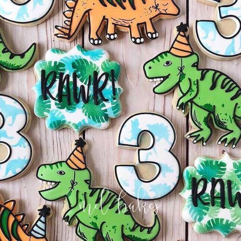 Melissa Wilson on Instagram: "Cute little dinosaur birthday cookies to match the decorations! 🦖🍪 . . #Dinosaurs #TRex #Stegosaurus #DinosaurCookies #Partysaurus #3rdBirthday #3rdBirthdayCookies #Rawr #Cookies #Decorated #DecoratedCookies #Custom #CustomCookies #TulsaCookies #Tulsa #Oklahoma #MelBakesTulsa" T Rex Cookies Decorated, Dinosaur Birthday Party Cookies, Dinosaur Birthday Cookies Boys, Three Rex Birthday Cookies, Dinosaur Cookies 3rd Birthday, 3 Rex Cookies, Dinosaur Decorated Cookies, Three Rex Cookies, Dinosaur Cookies Decorated