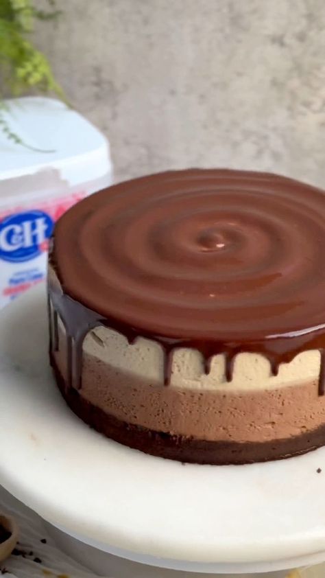 4.7K views · 130 reactions | The most recent incredible Mocha Mousse Cake! Layers of chocolate cake, light and airy chocolate mousse, creamy white chocolate mocha mousse, and a shiny chocolate glaze. Words aren’t enough to describe how divine this is. Grab the recipe at https://bakewithzoha.com/the-best-mocha-mousse-cake/ #mochamoussecake #mochalatte #whitechocolatemochalatte #mochacake #moussecake #chocolatecake #chocolatemoussecake #friendsgiving #dessert #cake #mousse | bakewithzoha | bakewithzoha · Original audio Mocha Mousse Cake, Friendsgiving Dessert, Choc Mousse, Mocha Mousse, Cake Mousse, Cake Light, Mocha Cake, White Chocolate Mocha, Chocolate Mocha