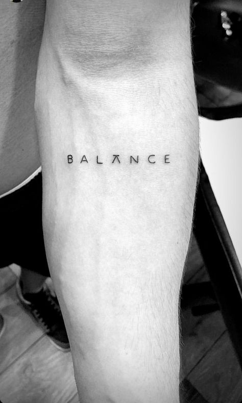 Balance Tatoos Ideas, Tattoo Ideas Balance, Life Balance Tattoo, Balance Tattoo Men, Queen Inspired Tattoos, Consistency Tattoo Ideas, Small Tattoo Man, Small Word Tattoos Men, Small Tattoos For Guys With Meaning