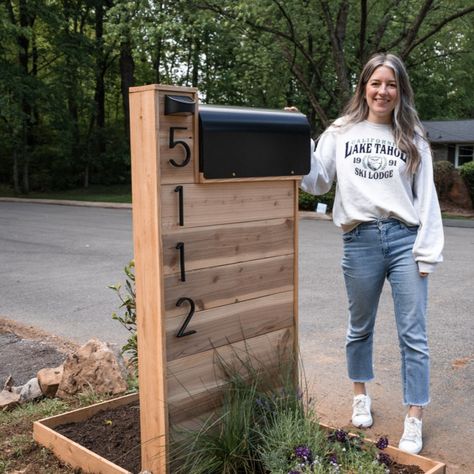 Build a modern Mailbox with solar lights and surrounding flower bed🌿🥀 #modernmailbox #home #outdoor #homeoutdoor #cedarmailbox #moderncedarmailbox #diyproject #diymailbox #diymodernmailbox #diymoderncedarmailbox #outdoordiy #easydiy #easysummerdiy Diy Farmhouse Mailbox Ideas, Mail Box Diy Outdoor, Farmhouse Mail Box Ideas, Sidewalk Mailbox Ideas, Mid Modern Mailbox, Flower Box Mailbox Ideas, Freestanding Mailbox Ideas, Wood Slat Mailbox Ideas, Curb Mailbox Ideas