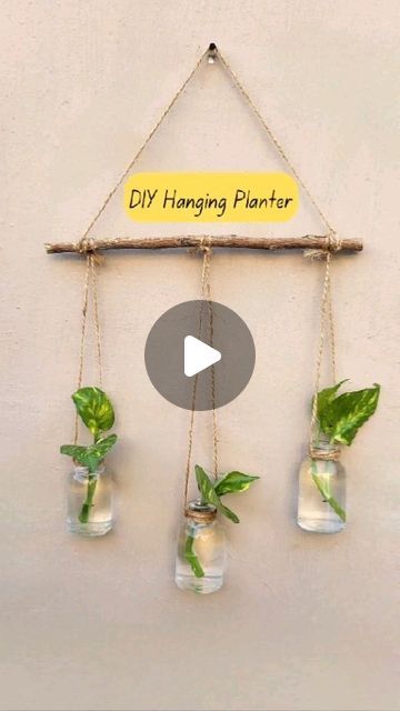 Bloomy on Instagram: "DIY Wall Hanging Mini Planter. I made this planter by using old mini glass bottles. Let me know if you have any questions. 😊 . . . #diyplanter #hangingplanter #diy #reuse #plantdecor #sustainableart #enviromentallyfriendly #creativeideas #wastetoart" Planters Ideas Indoor Diy, Diy Hanging Planter Easy, Hanging Glass Bottle Plants Ideas, Hanging Bottle Planters, Bottle Hanging Ideas, Diy Hanging Propagation Station, Indoor Hanging Plants Diy, Glass Bottle Planters Diy, Wall Planters Indoor Diy