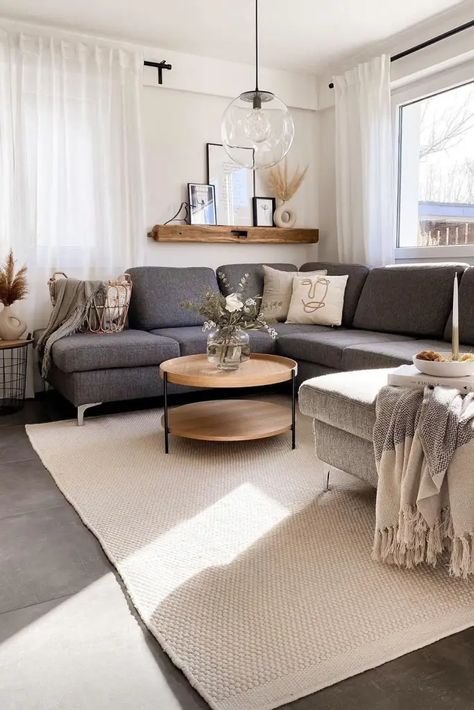 Styling Grey Sofa Living Rooms, Apartment Living Room Dark Grey Couch, Japandi Interiors Grey Sofa, Living Room Rug Dark Grey Couch, Grey Leather Couch Styling, Boho Chic Living Room Gray Couch, Gray Couch Area Rug Ideas, Cream Living Room Grey Sofa, Dark Gray And Beige Living Room Ideas