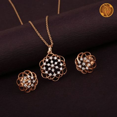 This 18kt Rose gold pendant Set is embellished with round brilliant diamonds.

Note: The given price is only for the pendant and Earrings, it does not include the Chain. Rose Gold Pendant Set, Gold Pendant Set, Pearl Earrings Designs, Antique Necklaces Design, Diamond Pendent, Diamond Pendants Designs, Diamond Earrings Design, Modern Gold Jewelry, Diamond Pendant Sets