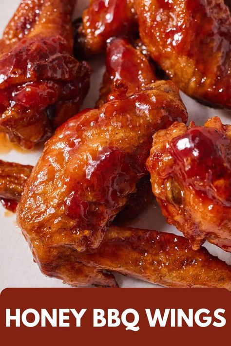 Crispy and juicy, these Honey BBQ Wings are perfect for an easy weeknight dinner or for a party. This crowd-pleasing chicken wings recipe is tender and coated in a delicious sweet, tangy, and sticky sauce. All you need are a handful of ingredients, and you’ll satisfy your craving for wings in no time. Honey Bbq Chicken Wings In The Oven, Crispy Bbq Chicken Wings, Honey Barbecue Chicken Wings, Honey Bbq Wings Baked, Honey Barbeque Chicken, Honey Chicken Wings Recipe, Honey Bbq Wings Recipe, Bbq Wings Recipe, Honey Bbq Chicken Wings