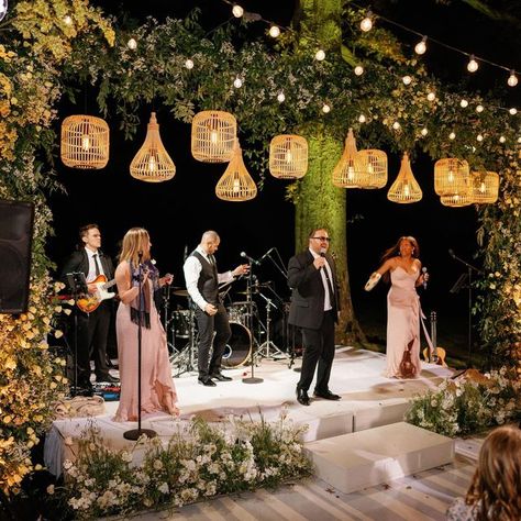 Kaytee Stice | Wedding Florist on Instagram: "There’s nothing quite like dancing under starlight. When the band starts the sounds of revelry begin! Planning + Design: @annaluciaevents Lighting: @jmeventgroup Dance Floor Wrap: @paradisegraphix Photo: @hunterryanphoto Entertainment: @aragonartists Floral Design: @rootsfloraldesign" Dance Floor Hanging Decor, Big Band Wedding, Wedding Dance Floor Decorations, Photo Stand Wedding, Wedding Dance Floor Design, Tent Dance Floor, Wedding Live Music, Starlight Wedding, Dance Floor Wrap