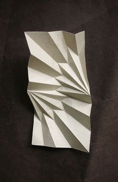 folded paper Paper Folding Art Design, Paper Folds Design, Paper Folding Sculpture, Folding Paper Techniques, Folded Paper Sculpture, 3d Paper Folding Art, Paper Engineering Techniques, Geometric Paper Folding, Folding Techniques Paper