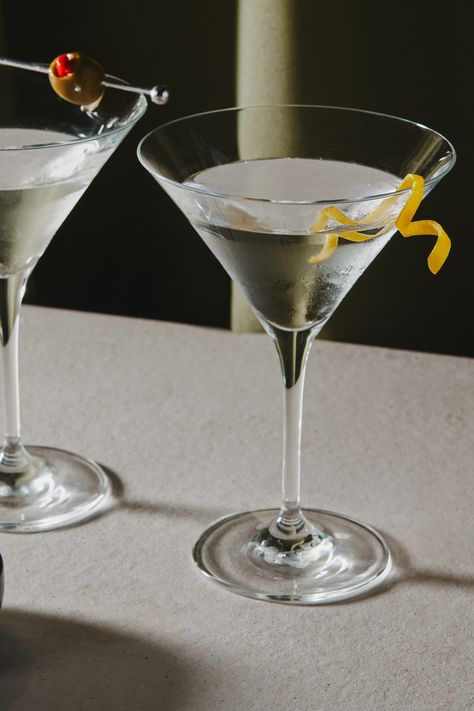 Like its gin-forward predecessor, the vodka martini cocktail recipe is endlessly customizable. Tweak the ratio of vodka to vermouth for a wet or dry martini; split the dry vermouth with sweet vermouth to make a “perfect martini” with vodka; season orange bitters and finish with a twist of lemon peel; add a splash of olive juice to make it a dirty martini—if you go for olive brine, ditch the lemon twist and garnish with fat green olives instead. Serve in a chilled martini glass or coupe. Martini With Lemon Twist, Vodka Martini With A Twist, Martini With A Twist, Slow Cooker Bean Soup, 21st Sign, Dirty Martini Recipe, School Moodboard, Mango Vodka, Martini Recipes Vodka