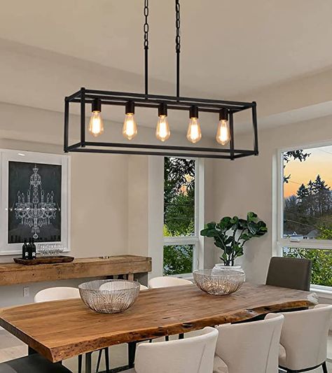 Dining Room Island Light Perfect Design：This rectangular 5-lights black kitchen island chandelier is finished with an open geometric metal frame and a modern industrial black finish and configured with five retro E26 bases, the simple linear pendant light fixture is the perfect addition to your home renovation. As an Amazon Associate I earn from qualifying purchases. Rectangle Chandelier Dining Room, Black Dining Room Light Fixture, Rectangle Kitchen Island, Modern Industrial Chandelier, Dinning Room Light Fixture, Rectangular Light Fixture, Cage Light Fixture, Rectangle Kitchen, Dinning Room Lighting