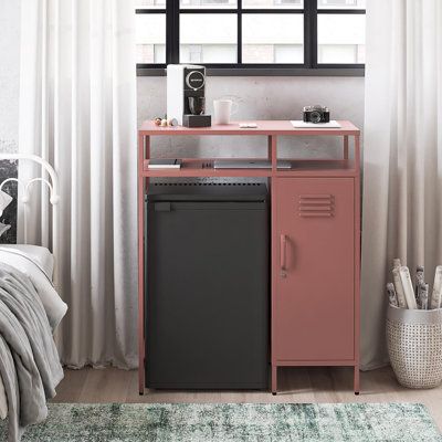 Keep your space chic and organized, no matter how cozy, with the Cache Metal Locker-Style Mini Refrigerator Organizer- a must-have for dorm dwellers, home office hustlers, and city slickers alike. Say goodbye to wasted nooks and crannies and hello to a sleek, upscale vibe in your abode. This compact wonder packs a punch with its clever mix of open and closed storage, perfect for tidying up your essentials or flaunting your faves. Plus, the top shelf serves up some serious horizontal real estate Small Office Coffee Station Mini Fridge, Mini Fridge Cabinet Office, College Dorm Appliances, Hidden Mini Fridge Cabinet, Mini Fridge Organizer, Bedroom Mini Fridge Ideas, Mini Fridge In Office, Skincare Station, College Dorm Furniture