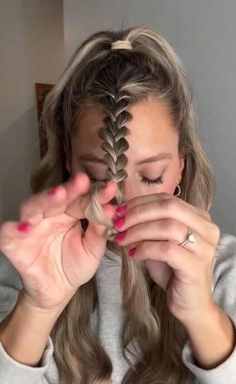 This is a guide on an easy faux Dutch braid. Learn a cute new hairstyle in this quick tutorial. How To Dutch Braid Into Ponytail, How To Dutch Braids, Casual Braids For Medium Hair, Faux French Braid Tutorials, Loose Double Braids, Front Braid Ponytail, Center Braid Hairstyles, Half Up Braid Tutorial, French Braid Alternative