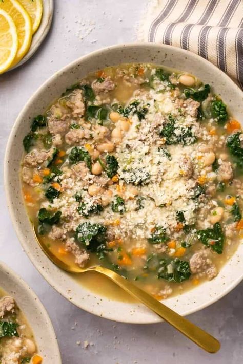 Enjoy an extra cozy and extra delicious meal with this White Bean Kale Sausage Soup. Made with a selection of veggies and Italian sausage, it supplies incredible nutrients and a great dose of protein! Bean Kale Sausage Soup, Kale Sausage Soup, White Bean Sausage Soup, Soup With White Beans, White Bean Kale, Kale Sausage, Bean And Sausage Soup, White Bean Kale Soup, Sausage And Kale