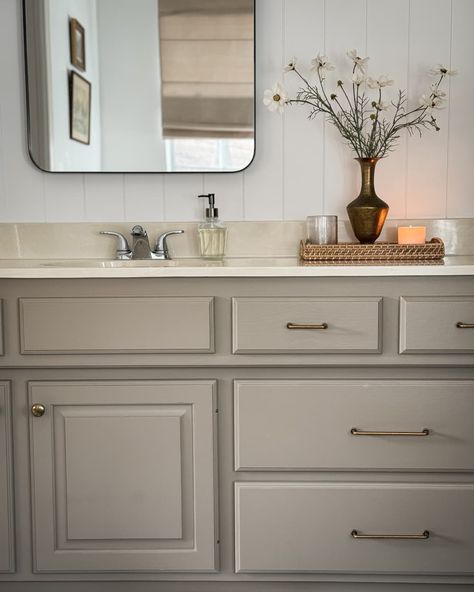 Bathroom Vanity Cream Countertop, Bathroom Vanity With White Countertop, Bathrooms With Cream Countertops, Tan Vanity Bathroom Ideas, Ivory Bathroom Cabinets, Almond Bathroom Update Ideas Paint, Painted Bathroom Cabinet Colors Master Bath, Taupe Painted Bathroom Cabinets, Ivory Bathroom Vanity