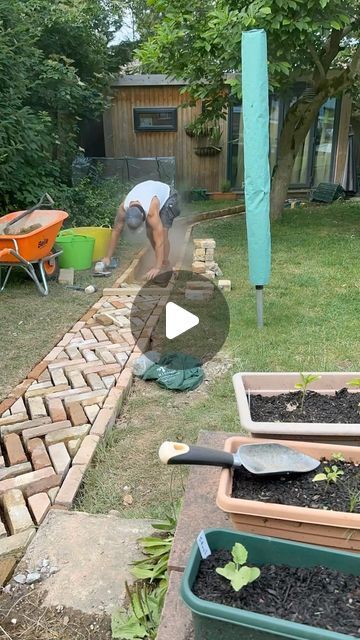 Tom Hall on Instagram: "Reclaimed bricks being laid.  3 slightly different sizes of bricks being laid so abit difficult to get it all matching up but we’re getting round it :)  Any enquiries please get in touch below   📞- 07464 976533  📩 - tgmlandscapes.info@gmail.com  💻 - www.tgmlandscapes.net  #bricks #reclaimed #path #herringbone #lawn #grass #carpenter #summer #gardener #gardening #landscape #landscaper #landscaping #garden #builder #hardwork #landscapegardening #sun #weather #hardwork #building #brickie #bricklayer #driveway #sand #cement #bricks #paving #progression #business" Hoggin Path Garden, Reclaimed Brick Pathway, Brick Path Garden, Pavement Design Paving Pattern, Walking Path Ideas, Brick Garden Path, Reclaimed Brick Patio, Reclaimed Brick Garden, Cement Bricks