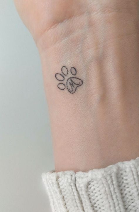 Minimal Hidden Tattoos, Special Dog Tattoo, Line Work Paw Print Tattoo, Remember Dog Tattoo, Doggie Tattoos Ideas, Minimal Pet Tattoo, Pet Remembrance Tattoo Dogs, Paw Print Tattoo With Initial, Tattoos For Lost Dogs