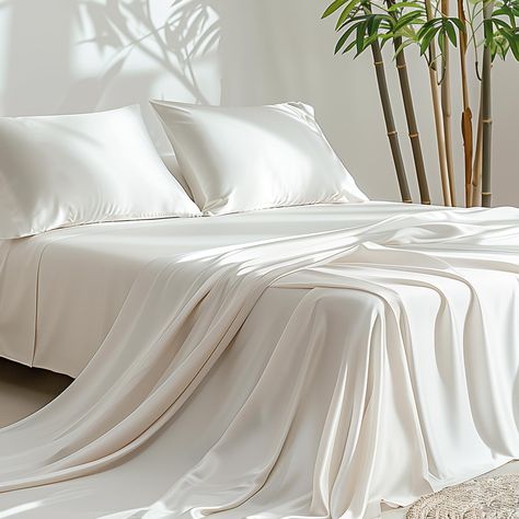 PRICES MAY VARY. 100% Viscose Derived from Bamboo - These sheets are OEKO-TEX Standard 100 certified, ensuring they are free from over 100 harmful substances, providing safe and healthy bedding for your family. Bamboo viscose fabric is naturally thermo-regulating, keeping you cool and relaxed while sleeping, providing all-season comfort. Ultimate Cooling Silk Softness - The moisture-wicking, breathable properties and silk-like softness of our hotel-grade bedding are great for hot sleepers or tho White Silk Bed Sheets, White Silk Bedding, White Silk Sheets, White Bed Sheet, Silk Bed Sheets, White Bed Sheets, College House, Luxury Bed Sheets, Silk Sheets