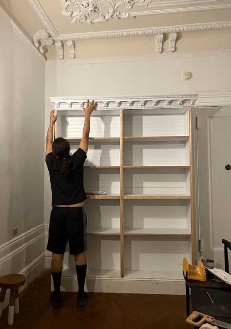 DIY Ikea Bookcase Makeover (No Powertools) - Hattie Kolp Half Wall Bookcase Built Ins, Trim Billy Bookcase, Bookshelf With Crown Molding, Ikea Billy Bookcase Crown Moulding, Billy Bookcase Molding, Add Crown Molding To Bookcase, Bookcase Crown Molding, Wallpaper For Bookshelves, Half Bookshelf Wall