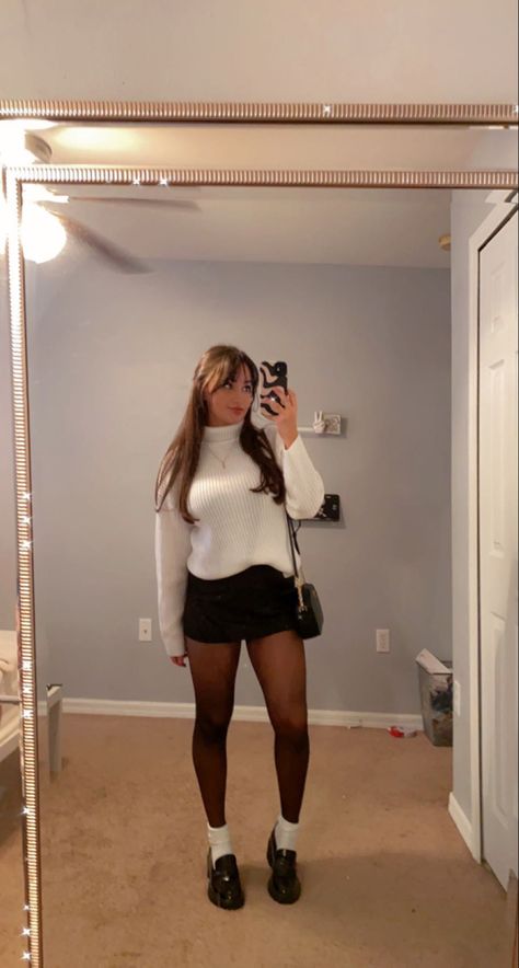 Shoes That Go With Mini Skirts, Black Skirt Outfit Winter Tights, Mini Dress With Sweater Over It, Chunky Sweater And Mini Skirt Outfit, How To Style Mini Skirts With Tights, Black Mini Skirt Outfit Sweater, White Leather Skirt Outfit Fall, Sweater Skirt And Tights Outfit, Sweater Dress Loafers