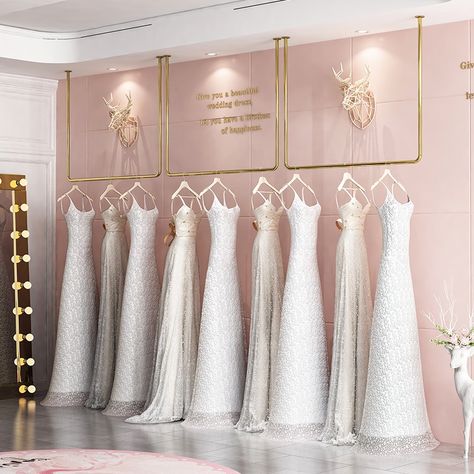 Bridal Store Gold Wall Mounted Wedding Dress Rack Boutique Garment Shop Wall Mounted Display Racks for Woman Clothes https://m.alibaba.com/product/1600501248738/Bridal-Store-Gold-Wall-Mounted-Wedding.html?__sceneInfo={"cacheTime":"1800000","type":"appDetailShare"} Couture Interior Design, Bridal Shop Design, Botique Interiors, Bridal Shop Interior, Bridal Shop Decor, Wedding Dress Display, Bridal Shop Ideas, Rack Decoration, Bridal Boutique Interior