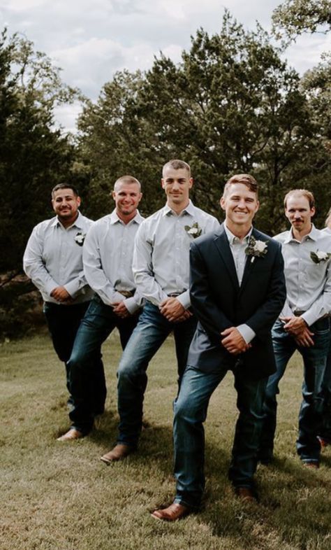 Blue Jean Groomsmen Attire, Navy Suit With Cowboy Boots, Simple Groom Attire Jeans, Groomsmen Vest And Bowtie, Groomsmen Wearing Jeans, Ring Bearer Outfit Jeans, Jean Groomsmen Outfits, Groom Attire With Jeans, Groom And Groomsmen Attire Jeans