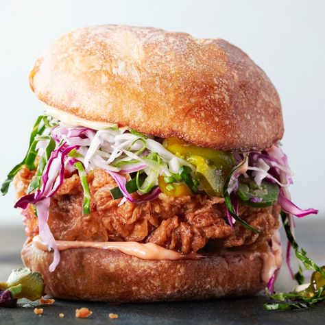 Slaw doesn't go next to this awesome fried chicken sandwich; it goes on the sandwich, along with a healthy dose of spicy mayo. Spicy Mayo Recipe, Sandwiches Chicken, Fried Chicken Sandwiches, Recipes Sandwiches, Mayo Recipe, Chicken Sandwich Recipes, Chicken Sandwiches, Fried Chicken Sandwich, Cole Slaw