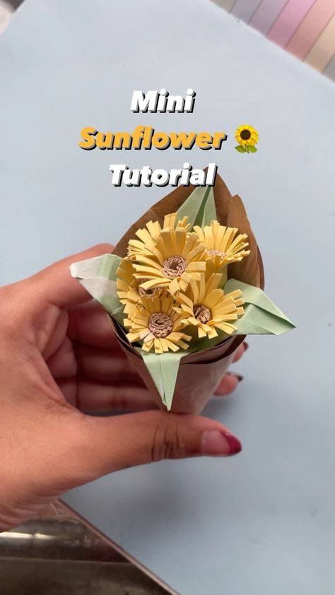 sherin - art/lifestyle on Instagram: "Detailed tutorial on mini paper sunflower! 👇🏻 Take a small rectangular paper Cut as shown in the video till mid way Do the same with…" Sunflower Paper Flowers, Sunflower Paper Craft, Paper Bouquet Diy, Paper Flower Bouquet Diy, Paper Flowers Diy Easy, Mini Sunflowers, Paper Sunflowers, Easy Paper Flowers, Flower Bouquet Diy