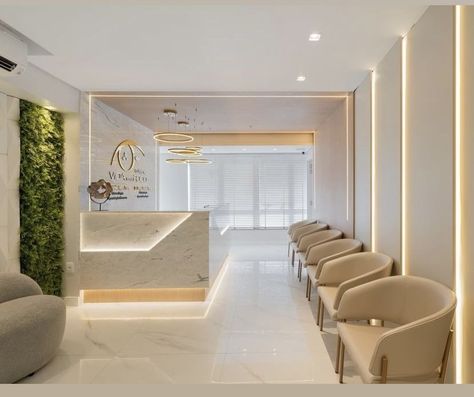 White And Gold Clinic Interior, Dermatologist Aesthetic Office, Dentist Studio Design, Commercial Accent Wall Ideas, Esthetician Office Ideas, Dermatologist Office Design, Dermatologist Clinic Interior Design, Dental Office Name Ideas, Med Spa Design Modern