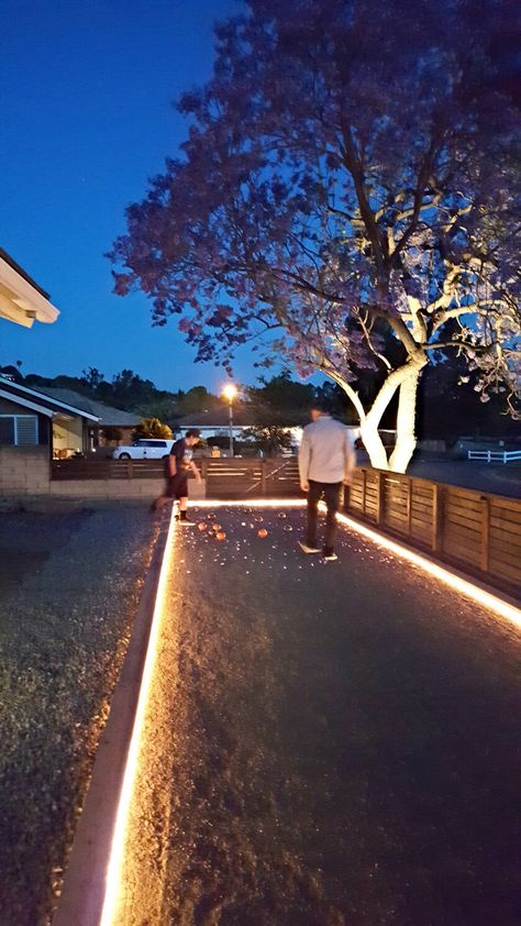 Outdoor Bocce Ball Court, Bachi Ball Court, Backyard Corn Hole Court, Bacci Ball Court, Corn Hole Court Backyard Ideas, Outdoor Game Area Design, Outdoor Cornhole Court, Petanque Court Ideas, Bocce Ball Court Backyard Diy