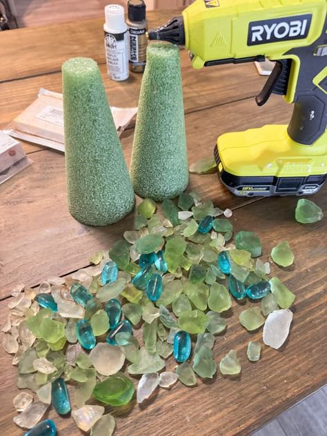 Create Sparkling Sea Glass Christmas Trees in Simple Steps Diy Mermaid Christmas Ornaments, Diy Glass Gems Crafts, Driftwood Sea Glass Art, How To Make Sea Glass Tree, Driftwood With Plants, How To Make A Seaglass Christmas Tree, Sea Glass Xmas Trees, Sea Glass Wreath Diy, Sea Glass Trees Diy