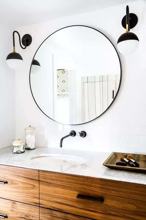 30 Ways to Style Large Round Mirrors Oversized Round Mirror, 25 Beautiful Homes, Large Round Mirror, Mid Century Bathroom, Farmhouse Remodel, Upstairs Bathrooms, Updating House, Round Mirror, House Doctor