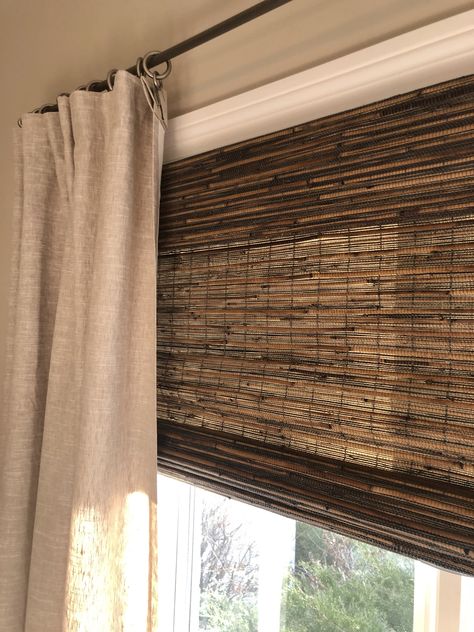 Living room woven wood shades, Long Grove, IL Jute Blinds Living Rooms, Wood Blinds With Curtains Living Room, Curtains With Wood Blinds, Window Treatments For Dark Walls, Dark Woven Wood Shades, Dark Woven Blinds, Drapes With Wood Blinds, Brown Window Shades, Rattan Blinds With Curtains