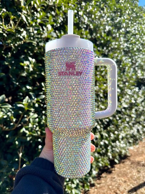 Beautiful full bling 40oz authentic Stanley cup using ab rhinestones.  Recommend hand wash only. Bling Stanley Cup, Preppy Stanley, Bedazzled Stuff, Rhinestone Ideas, Bedazzled Bottle, Cup Cabinet, Trendy Water Bottles, Rhinestone Cups, Diy Wine Glasses