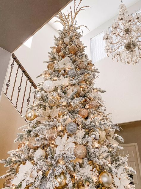 White and Gold Christmas Home Tour - Rebecca Taig Silver And Gold Winter Wonderland, Nice Christmas Trees, Modern Flocked Christmas Trees Decorated, White Christmas Tree Decorating Ideas Winter Wonderland, Winter Wonderland Christmas Tree Theme, Luxe Christmas Decor, Winter Wonderland Christmas Decorations, Winter Wonderland Tree, 12 Foot Christmas Tree