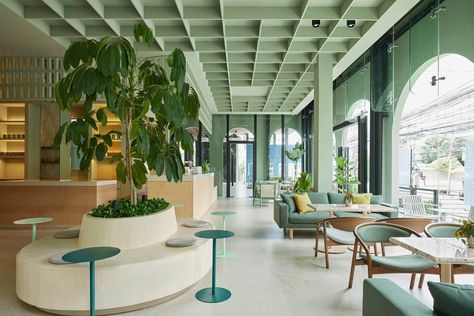 A Tranquil Cafe in Downtown Bangkok — Design Anthology Indoor Landscaping, Office Cafeteria, Green Cafe, Design Anthology, Earth Materials, Planter Bench, Breakout Area, Traditional Paint, Glazed Ceramic Tile